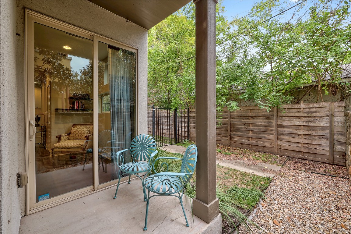 1205 Elm Street, Unit 8 Austin, TX 78703 - Photo 24 of 26 Fenced backyard featuring a patio