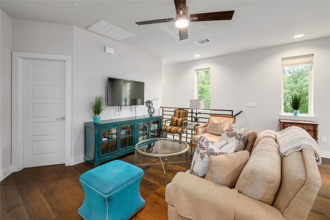 1205 Elm Street, Unit 8 Austin, TX 78703 - Photo 4 of 26 Living room with dark wood flooring and tons of natural light.