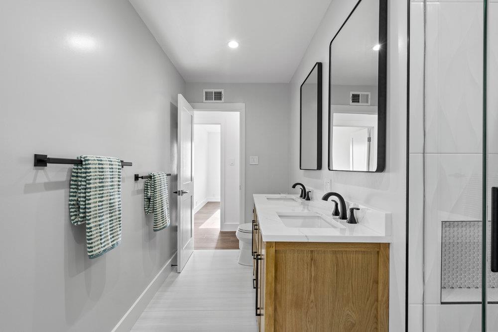 418 Imperial Drive Pacifica, CA 94044 - Photo 35 of 70 a bathroom with a sink and a mirror