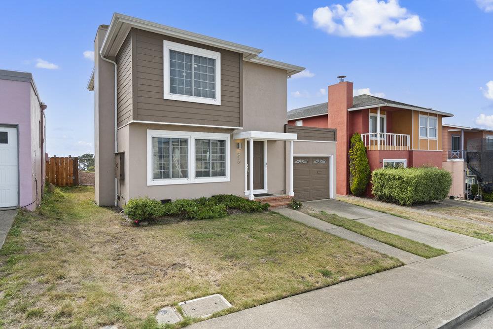 418 Imperial Drive Pacifica, CA 94044 - Photo 59 of 70 a front view of a house with garden
