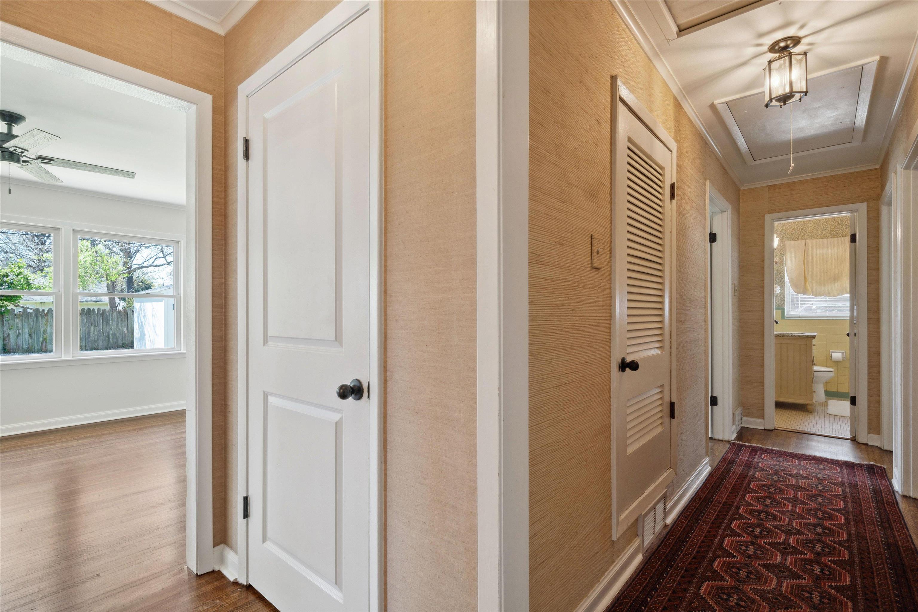 4821 Dee Road Memphis, TN 38117 - Photo 4 of 25 a view of a hallway with wooden floor and windows
