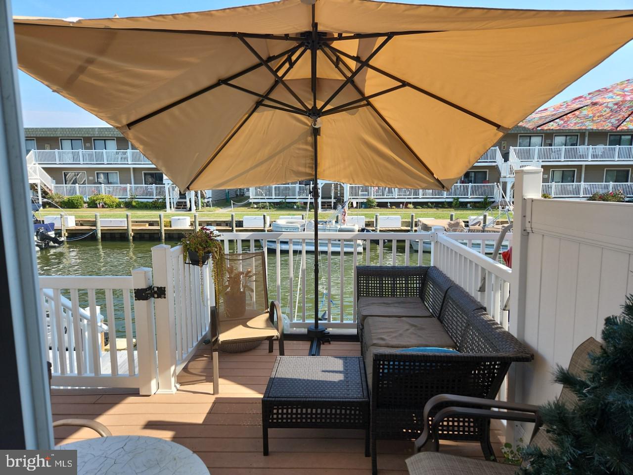 720 Rusty Anchor Road, Unit 42 Ocean City, MD 21842 - Photo 3 of 20 Deck Overlooking The Water Views