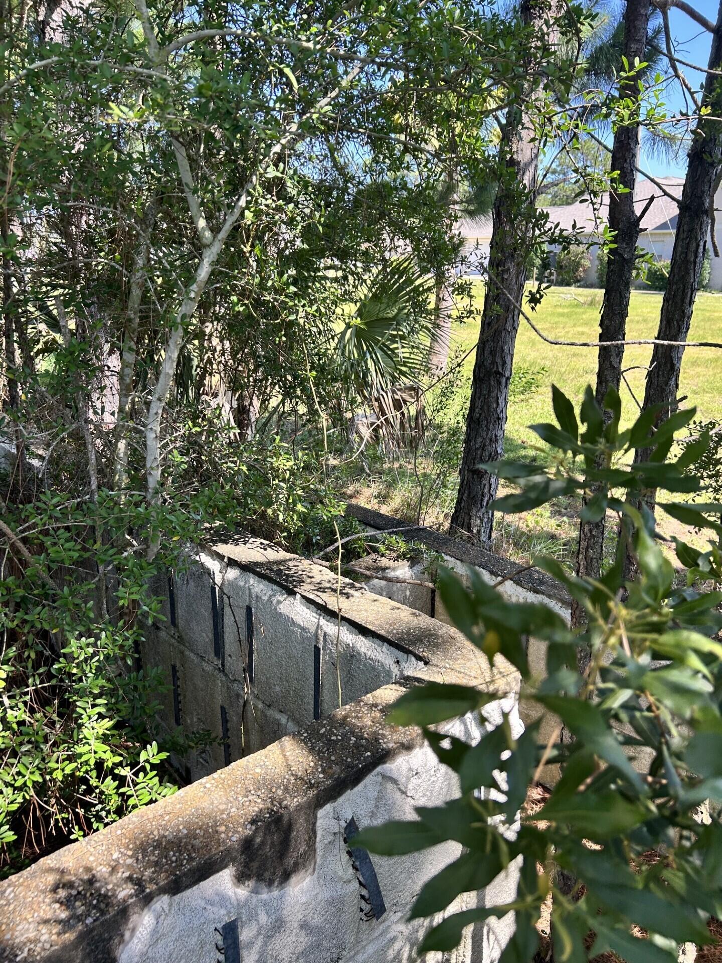 1021 Pearson Road Milton, FL 32583 - Photo 10 of 12 a view of backyard with a table and chairs