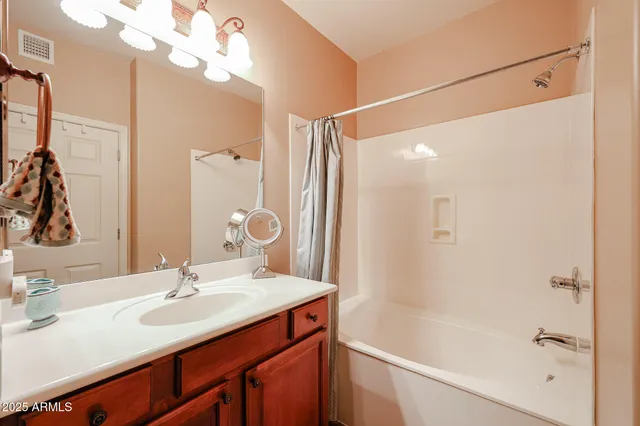 a bathroom with a toilet and a sink