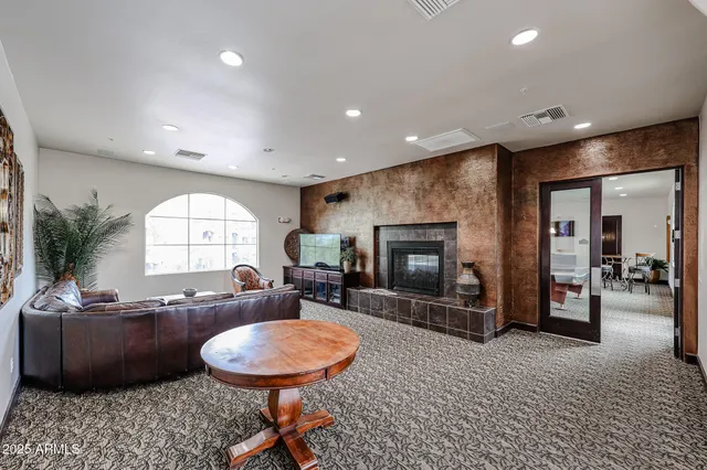a room with gym equipment and mirrors