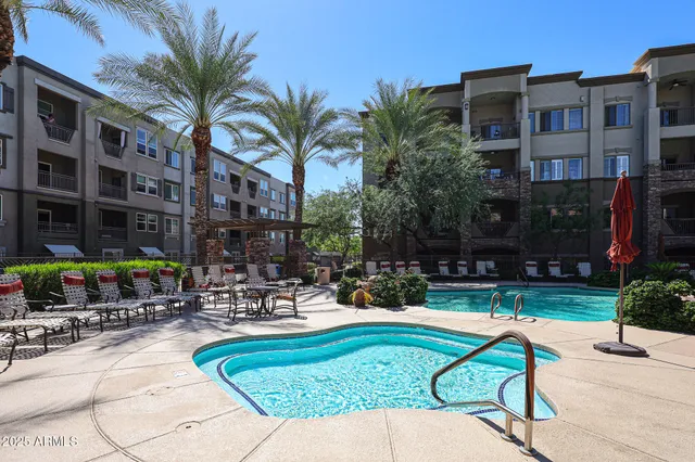 a view of a backyard with sitting area and furniture