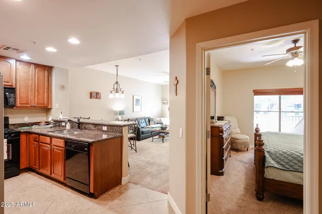 a kitchen with a table and chairs