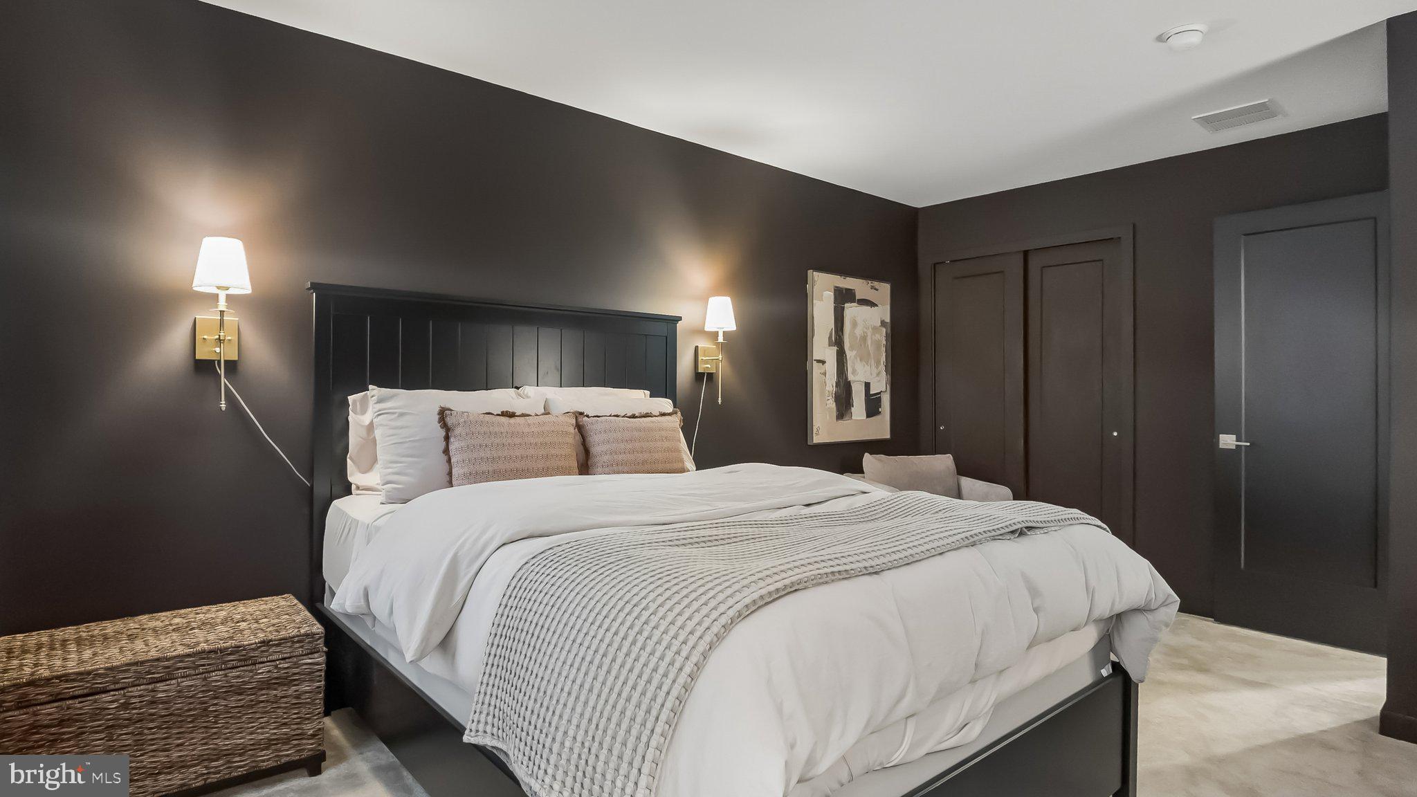 257 Junction Road Media, PA 19063 - Photo 16 of 25 a bedroom with a bed and a night stand