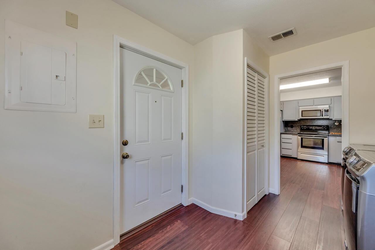 5448 Mt Olive Road Crestview, FL 32539 - Photo 14 of 37 a view of kitchen with livingroom and hardwood floor
