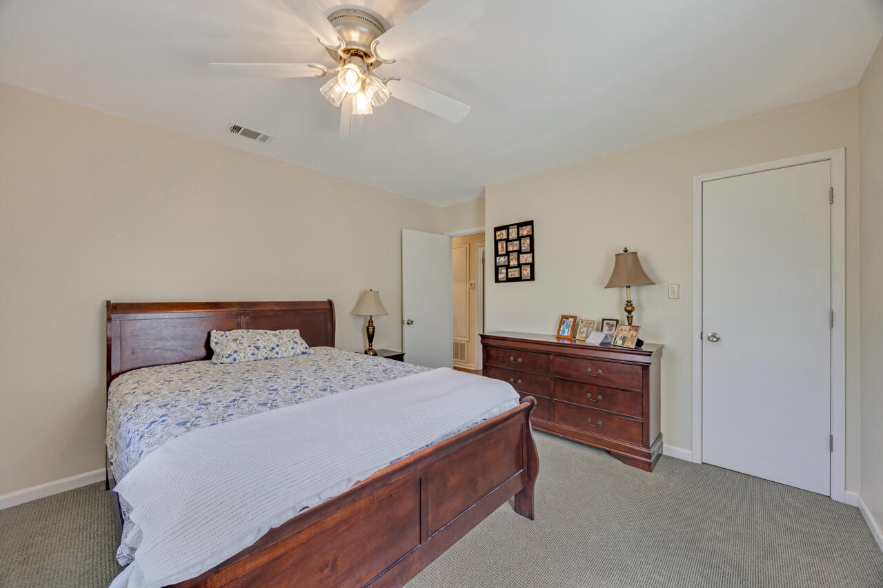 5448 Mt Olive Road Crestview, FL 32539 - Photo 20 of 37 a bedroom with a bed and a dresser