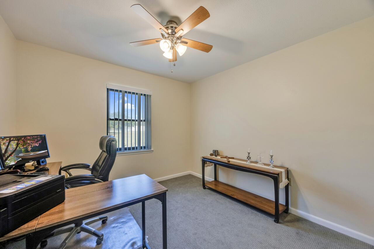 5448 Mt Olive Road Crestview, FL 32539 - Photo 22 of 37 a room with furniture and window