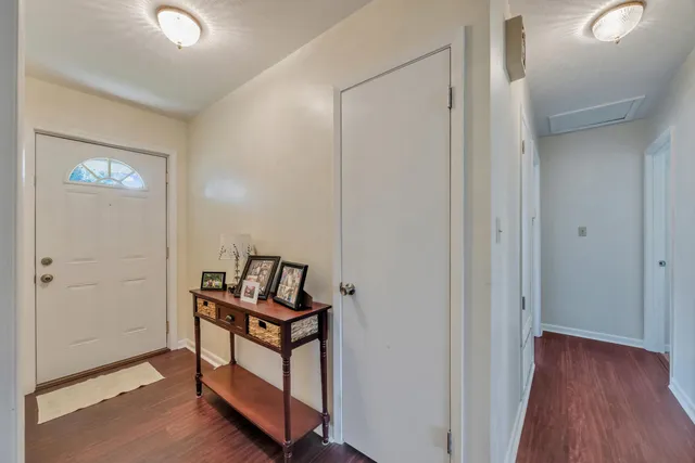 a view of room with hardwood floor