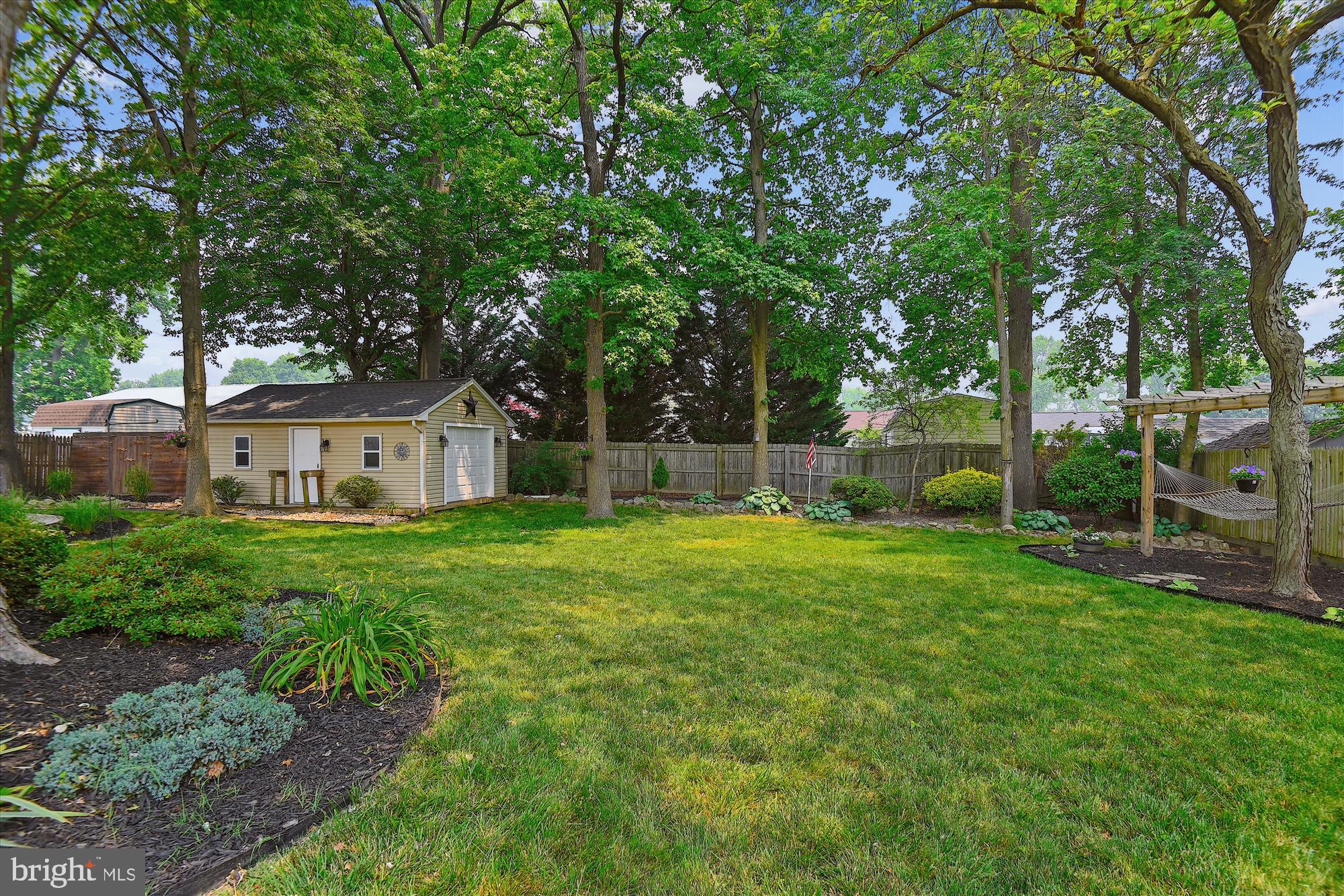 2305 Lodge Farm Road Sparrows Point, MD 21219 - Photo 35 of 37 a view of a house with backyard and sitting area