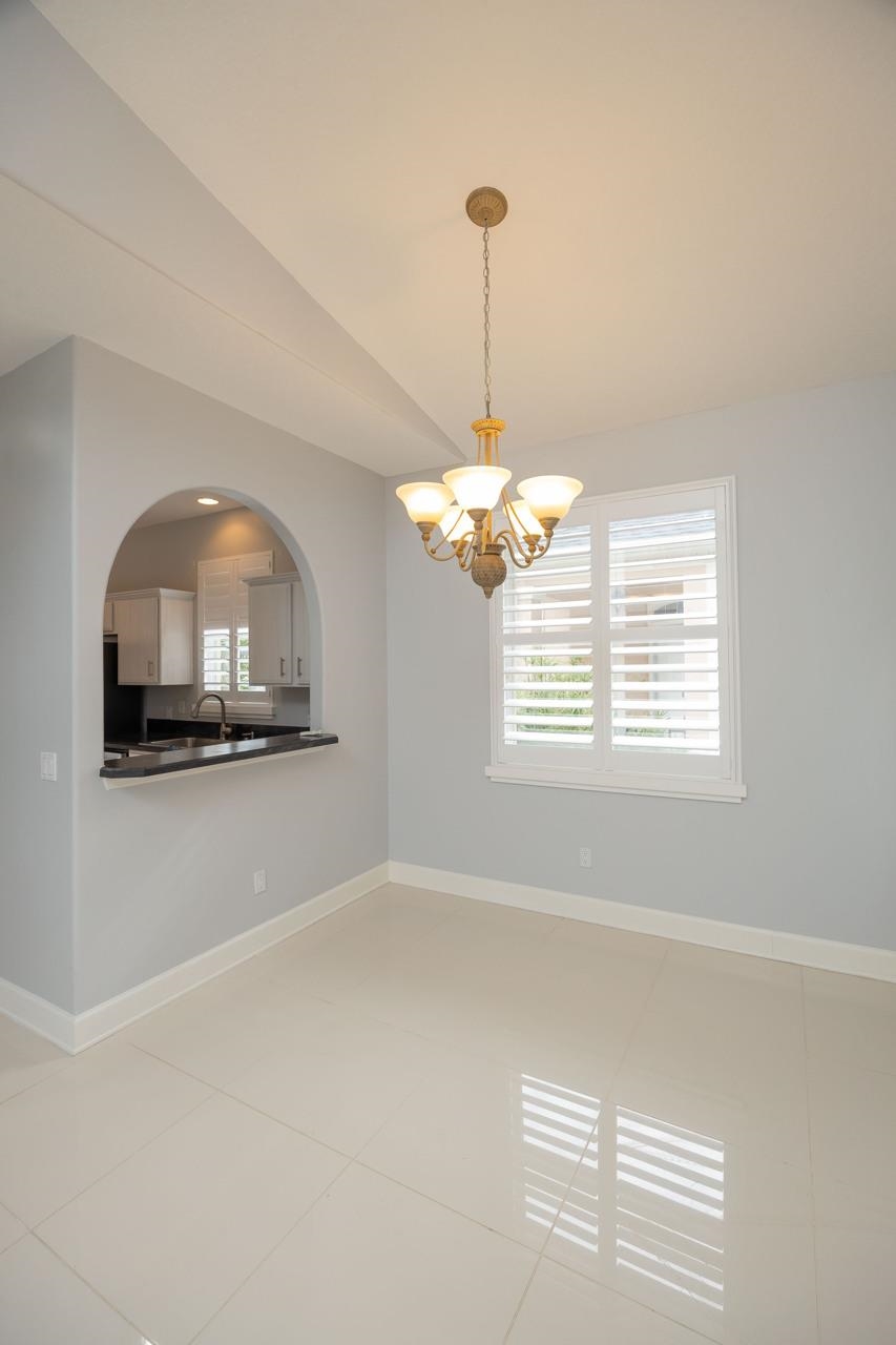 573 Boxwood Place St. Augustine, FL 32086 - Photo 14 of 40 a view of a livingroom with a chandelier