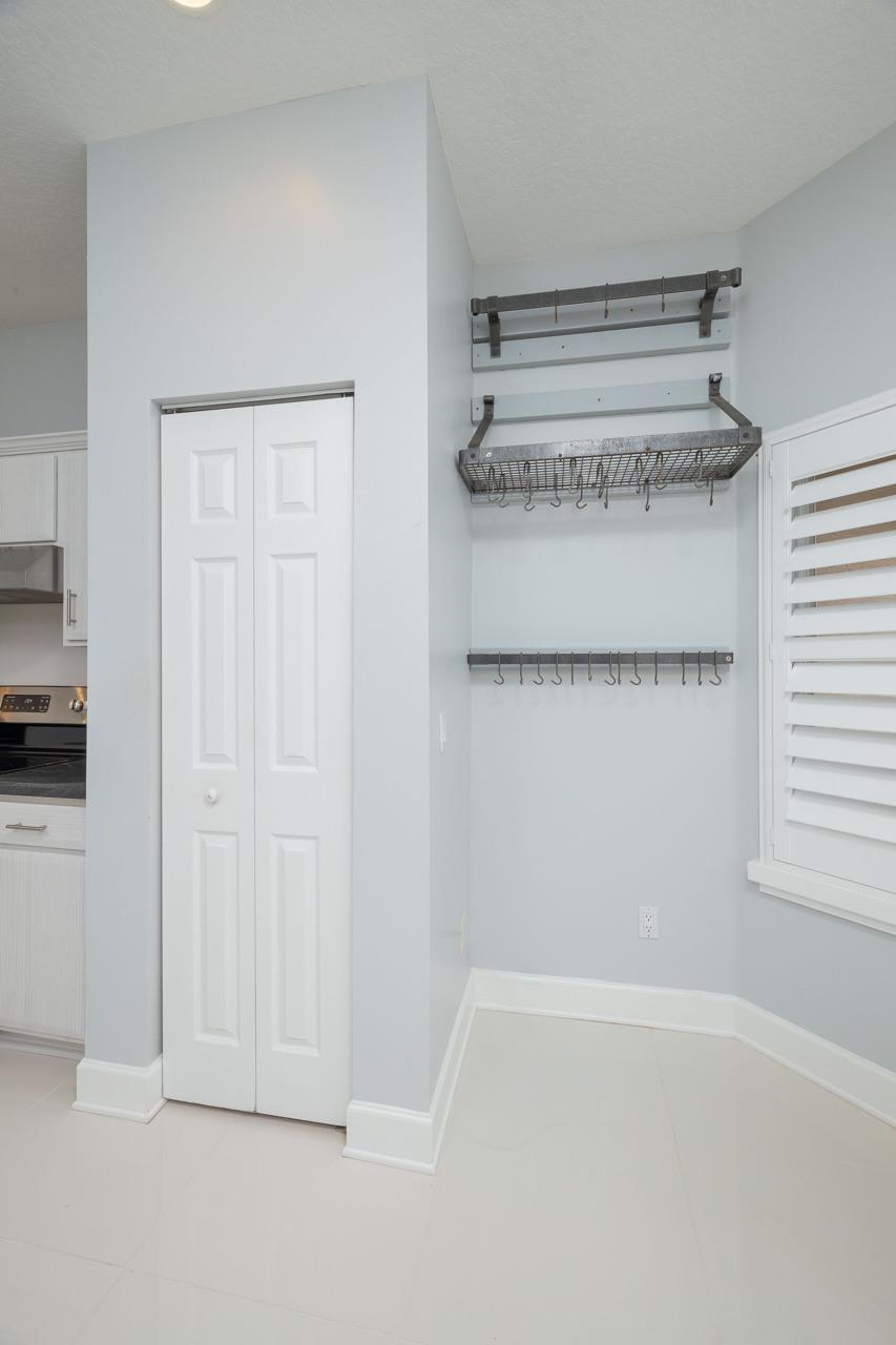 573 Boxwood Place St. Augustine, FL 32086 - Photo 19 of 40 a view of a room with rack on the wall