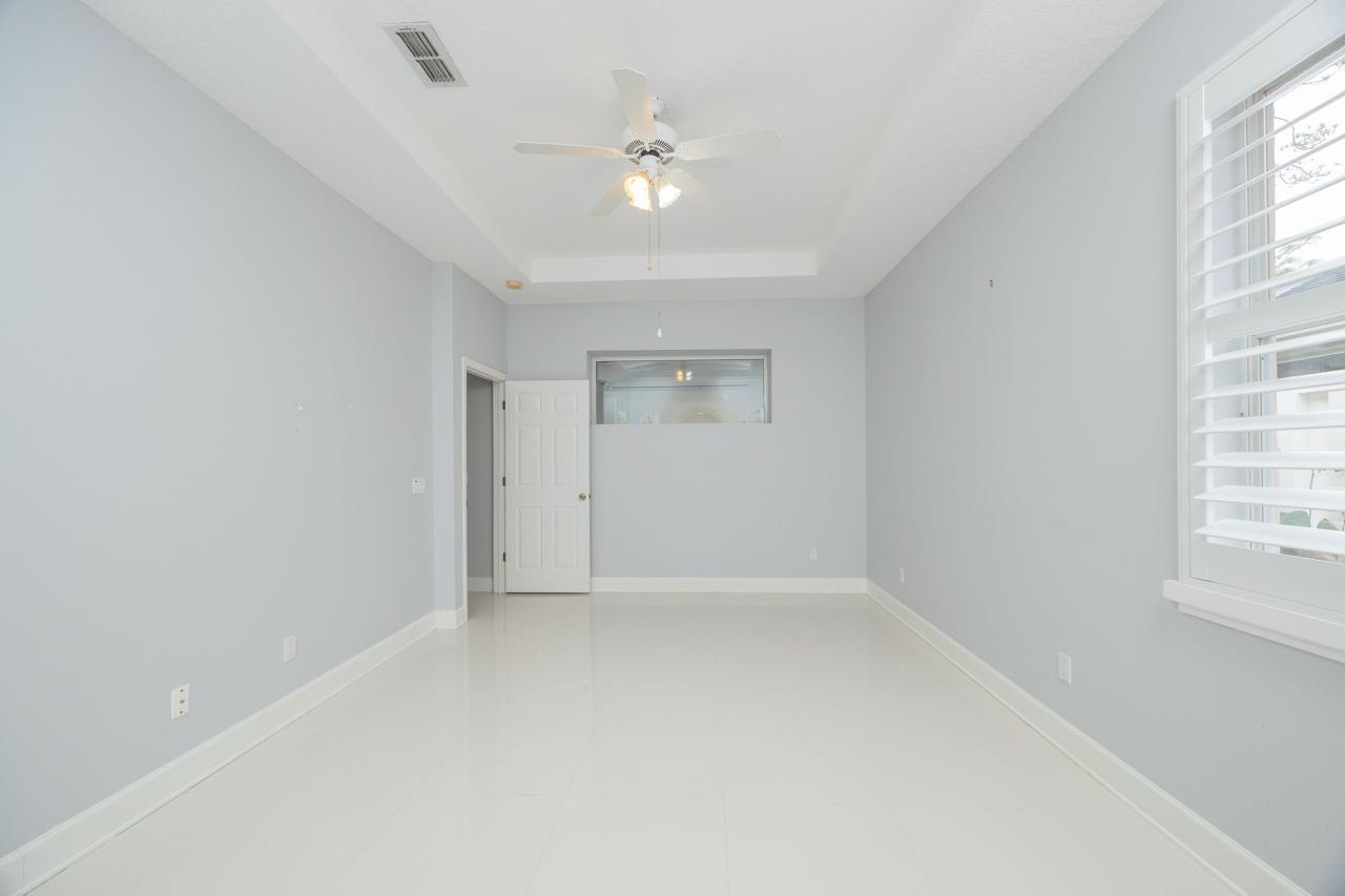 573 Boxwood Place St. Augustine, FL 32086 - Photo 31 of 40 an empty room with windows and closet