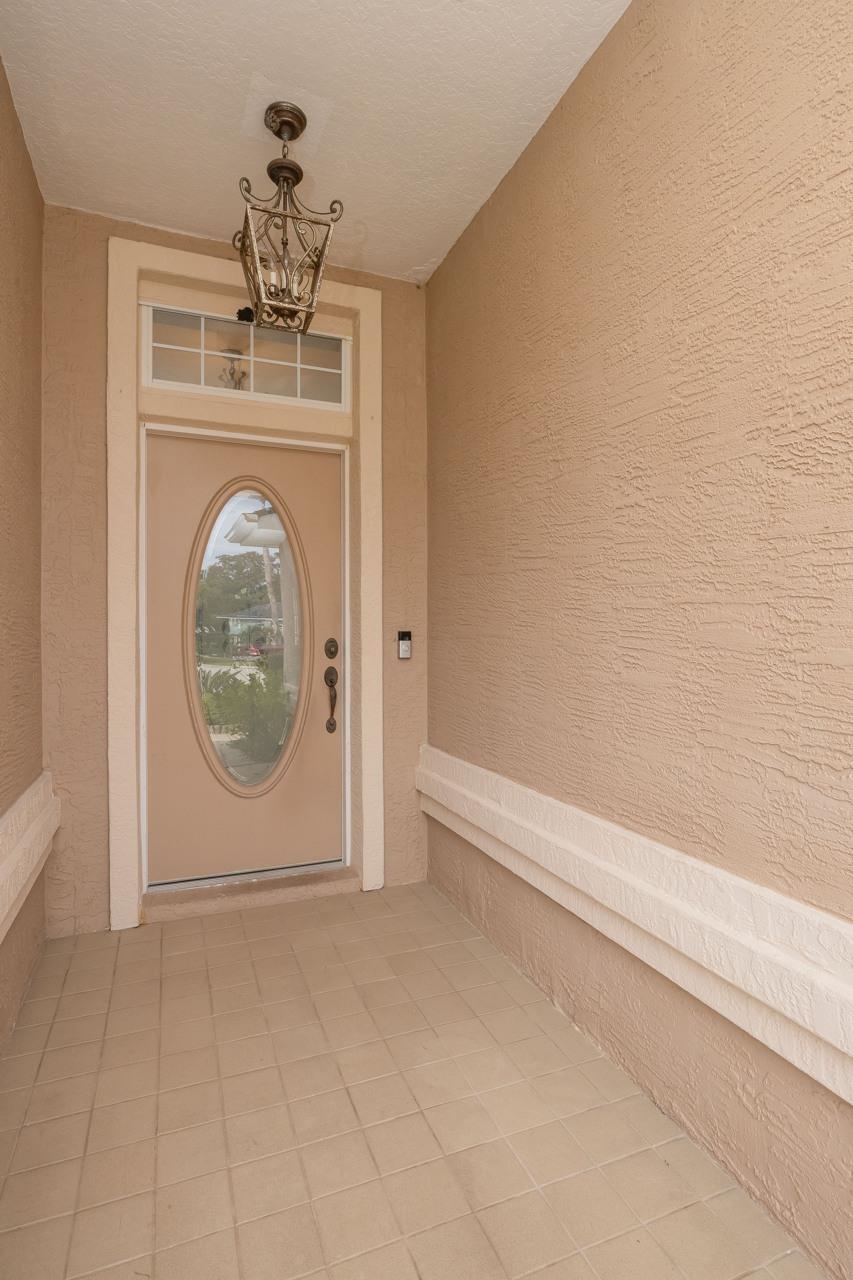 573 Boxwood Place St. Augustine, FL 32086 - Photo 5 of 40 a view of a livingroom with washer and dryer