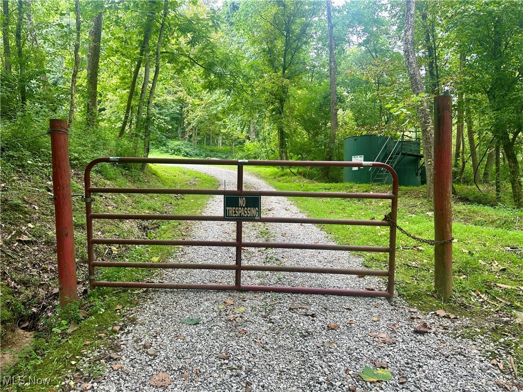 325 North Fork Road New Matamoras, OH 45767 - Photo 8 of 50 Gate with a forest view