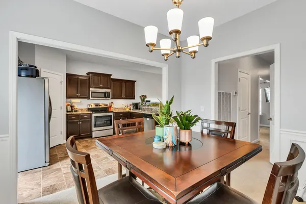 a view of a dining room with furniture