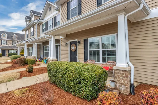 a house view with a outdoor space