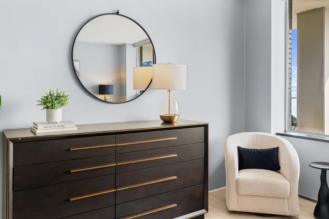 a bathroom with a sink and mirror