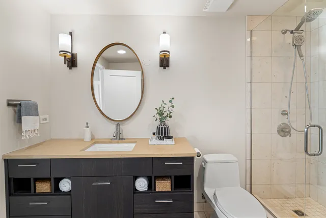 a kitchen that has a sink and a stove in it