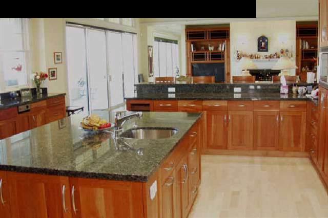 155 Pulehu Road Kula, HI 96790 - Photo 11 of 18 a kitchen with stainless steel appliances granite countertop a sink and a counter top space