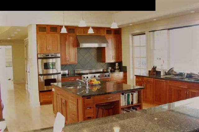155 Pulehu Road Kula, HI 96790 - Photo 12 of 18 a kitchen with a sink stove and cabinets