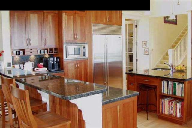155 Pulehu Road Kula, HI 96790 - Photo 7 of 18 a kitchen with stainless steel appliances granite countertop a sink refrigerator and cabinets