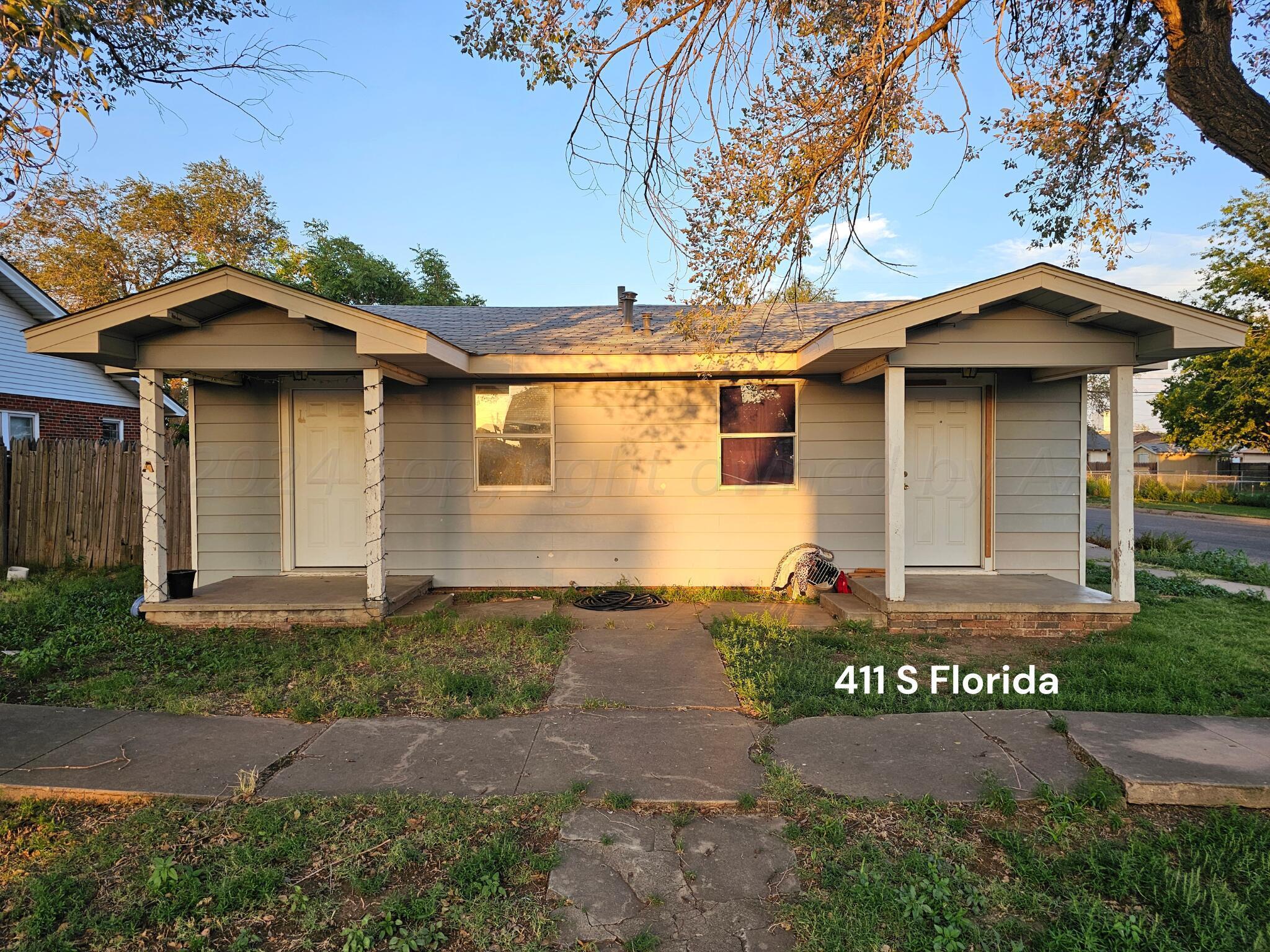 Amarillo Investments Portfolio Amarillo, TX 79106 - Photo 17 of 22 a front view of a house with garden