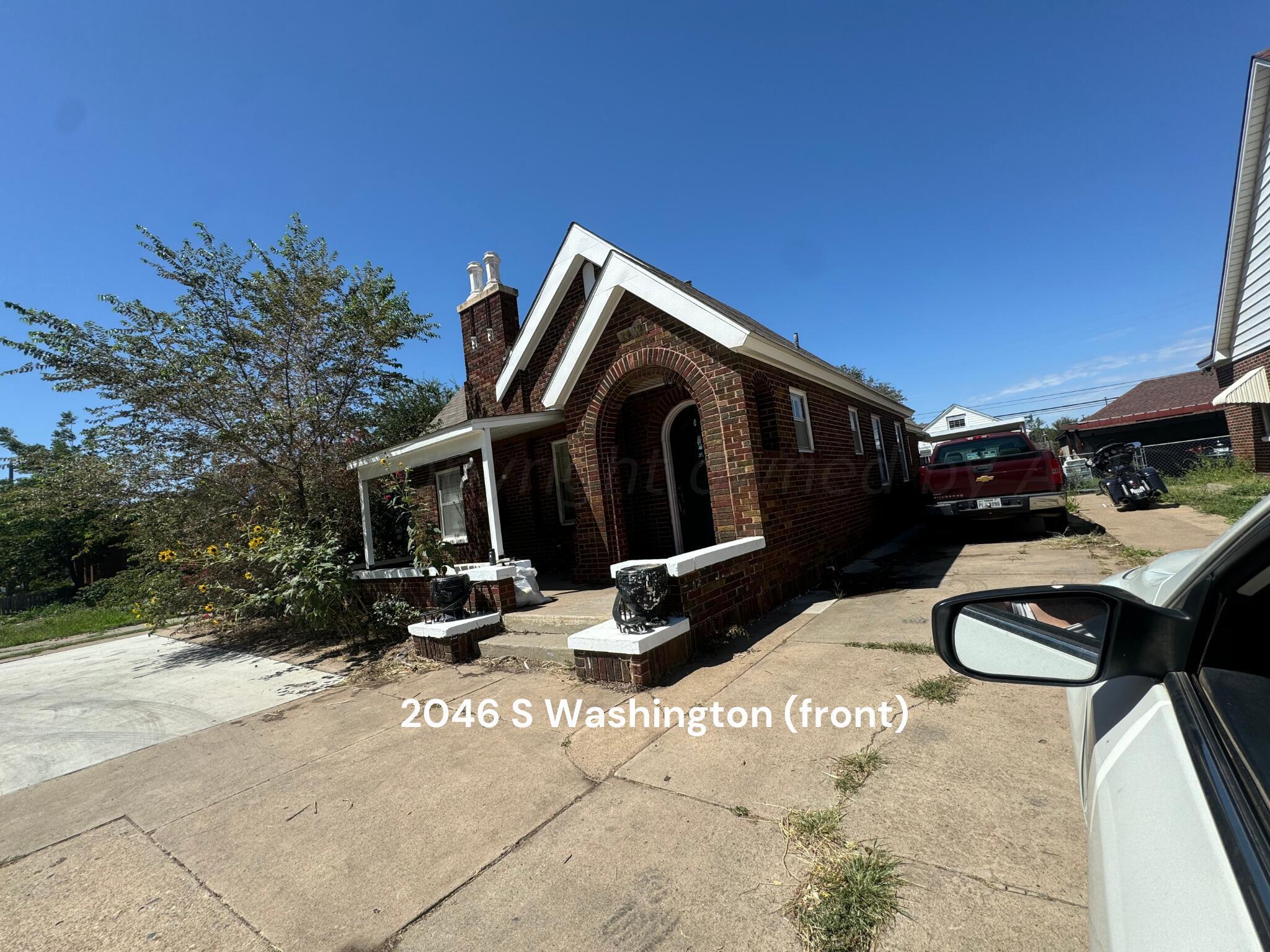 Amarillo Investments Portfolio Amarillo, TX 79106 - Photo 9 of 22 a front view of a house with parking area