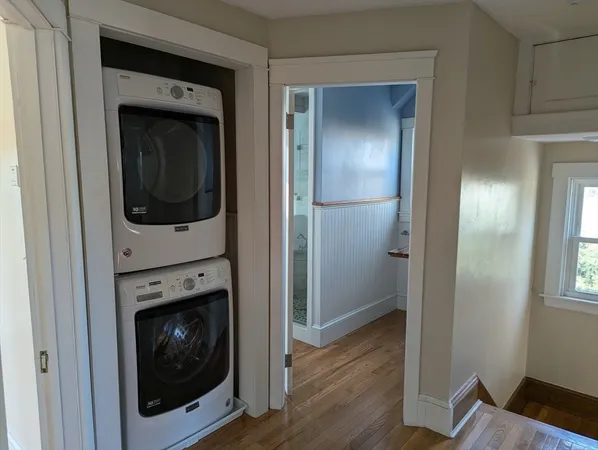 a utility room with washer and dryer