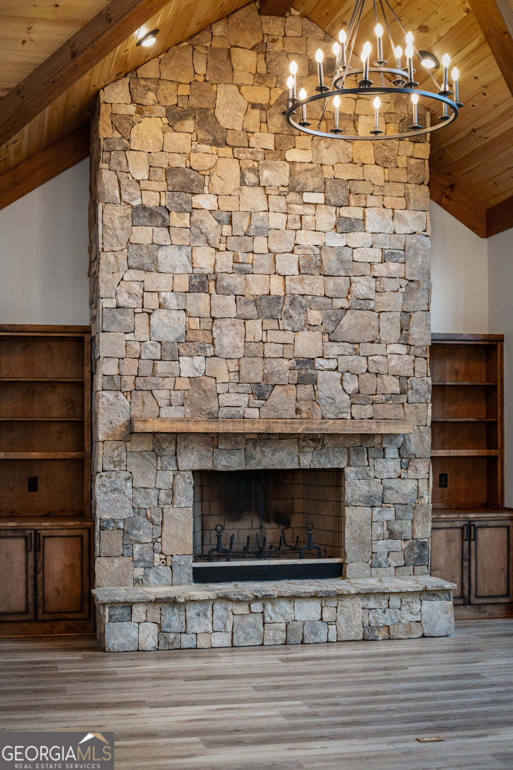 120 Cohutta Ranch Road Blue Ridge, GA 30513 - Photo 45 of 90 a living room with a fireplace and a flat screen tv