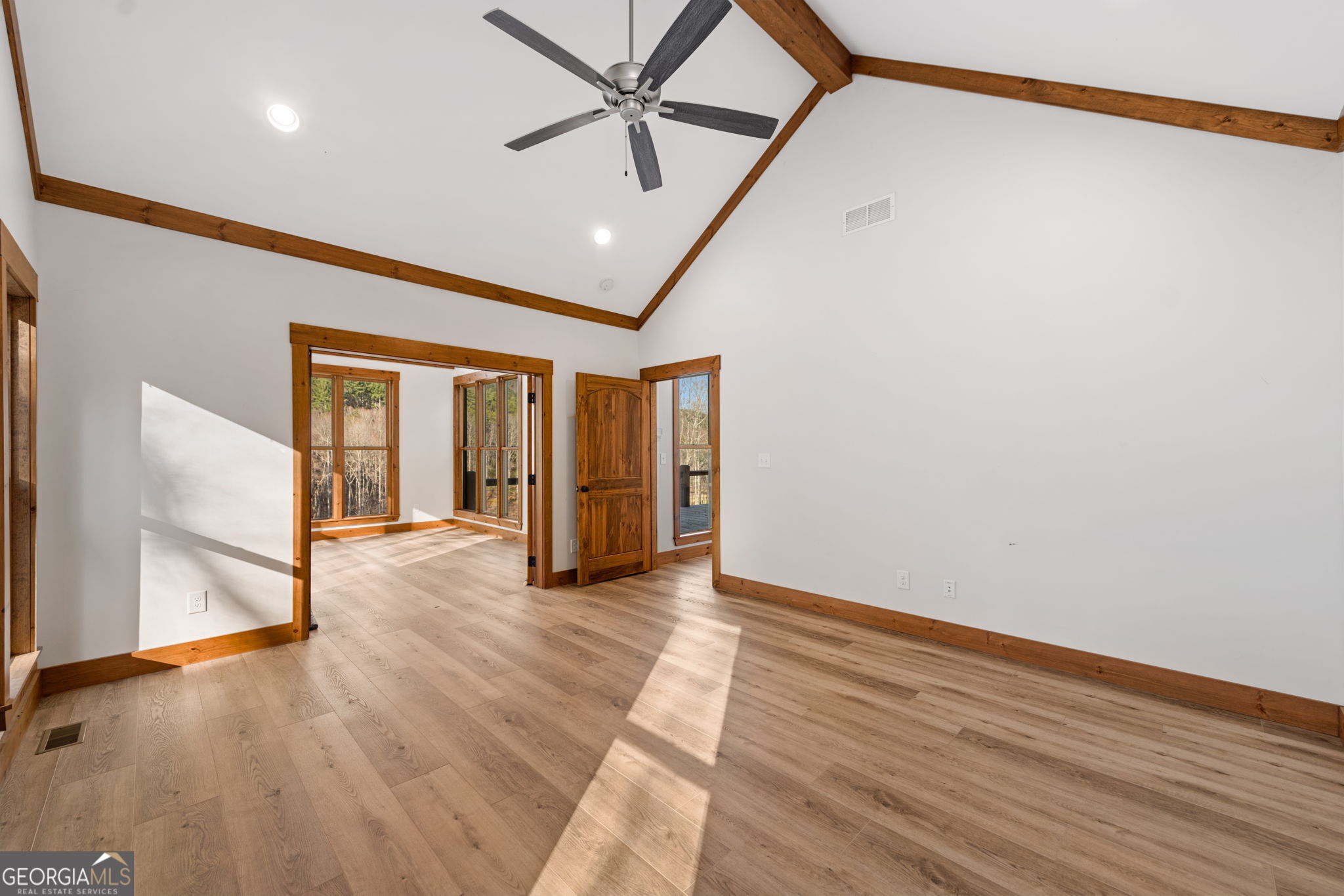 120 Cohutta Ranch Road Blue Ridge, GA 30513 - Photo 60 of 90 a view of an empty room with wooden floor and a window