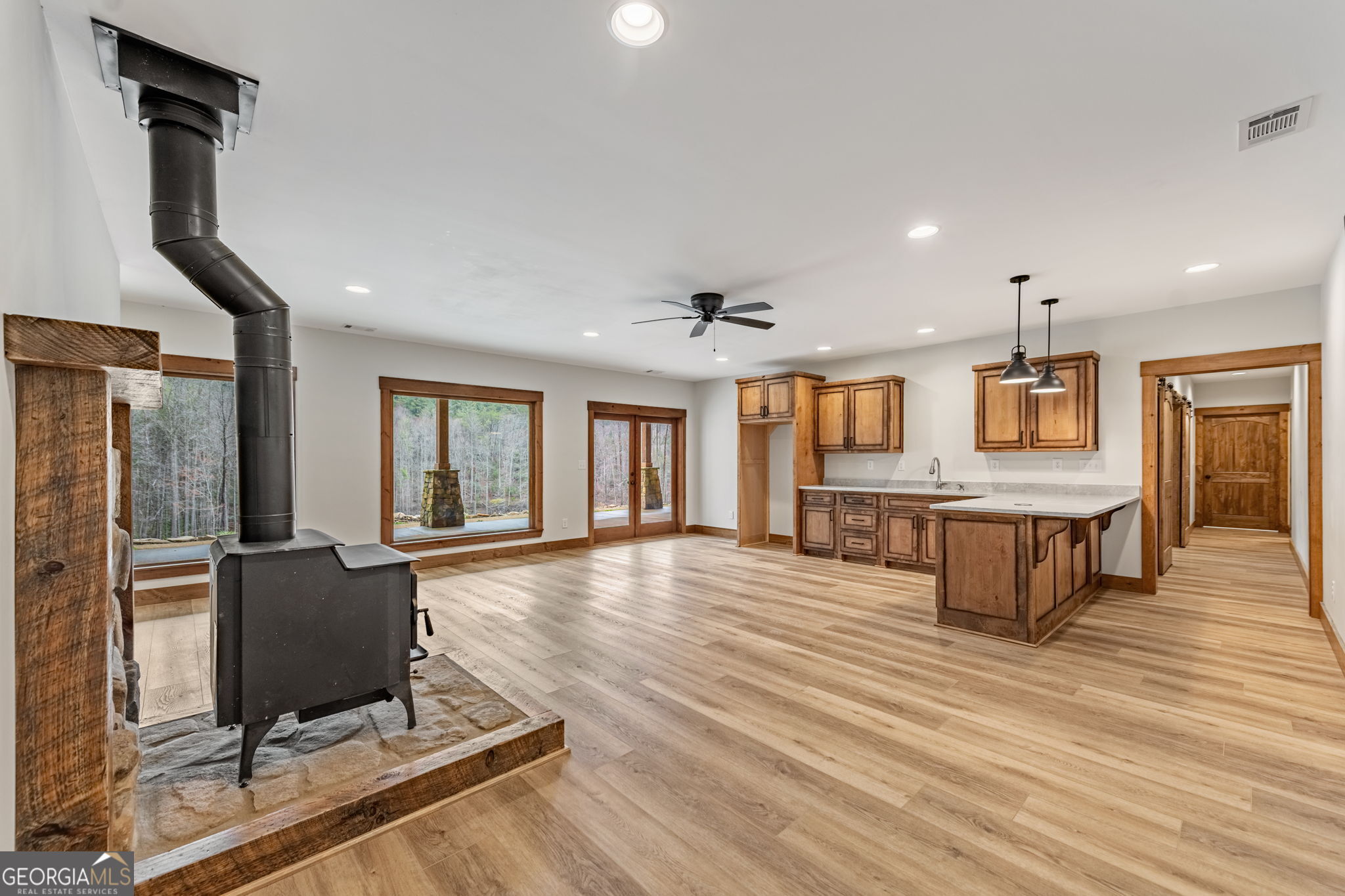 120 Cohutta Ranch Road Blue Ridge, GA 30513 - Photo 66 of 90 a living room with furniture and large windows