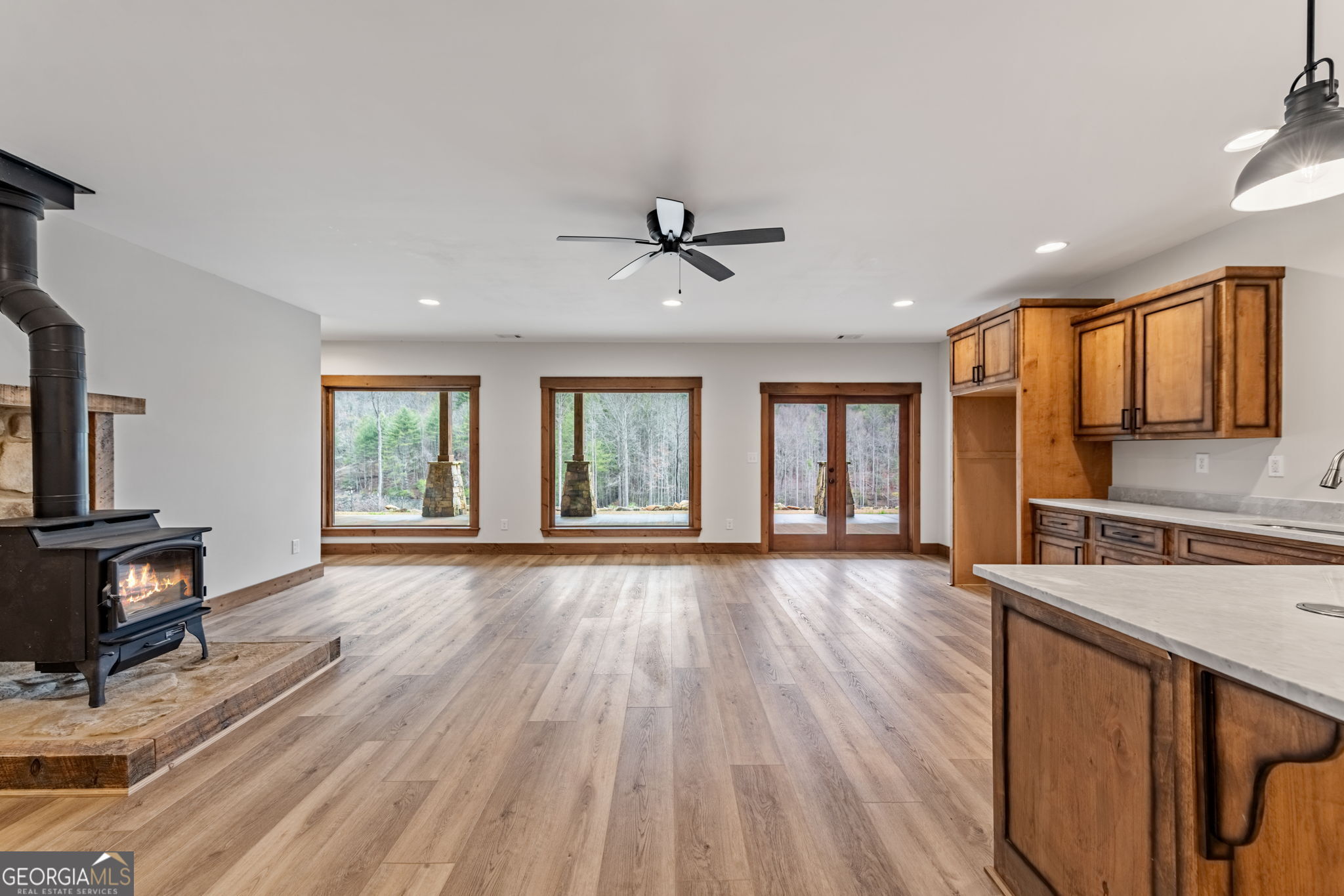 120 Cohutta Ranch Road Blue Ridge, GA 30513 - Photo 67 of 90 a view of an empty room with window and wooden floor