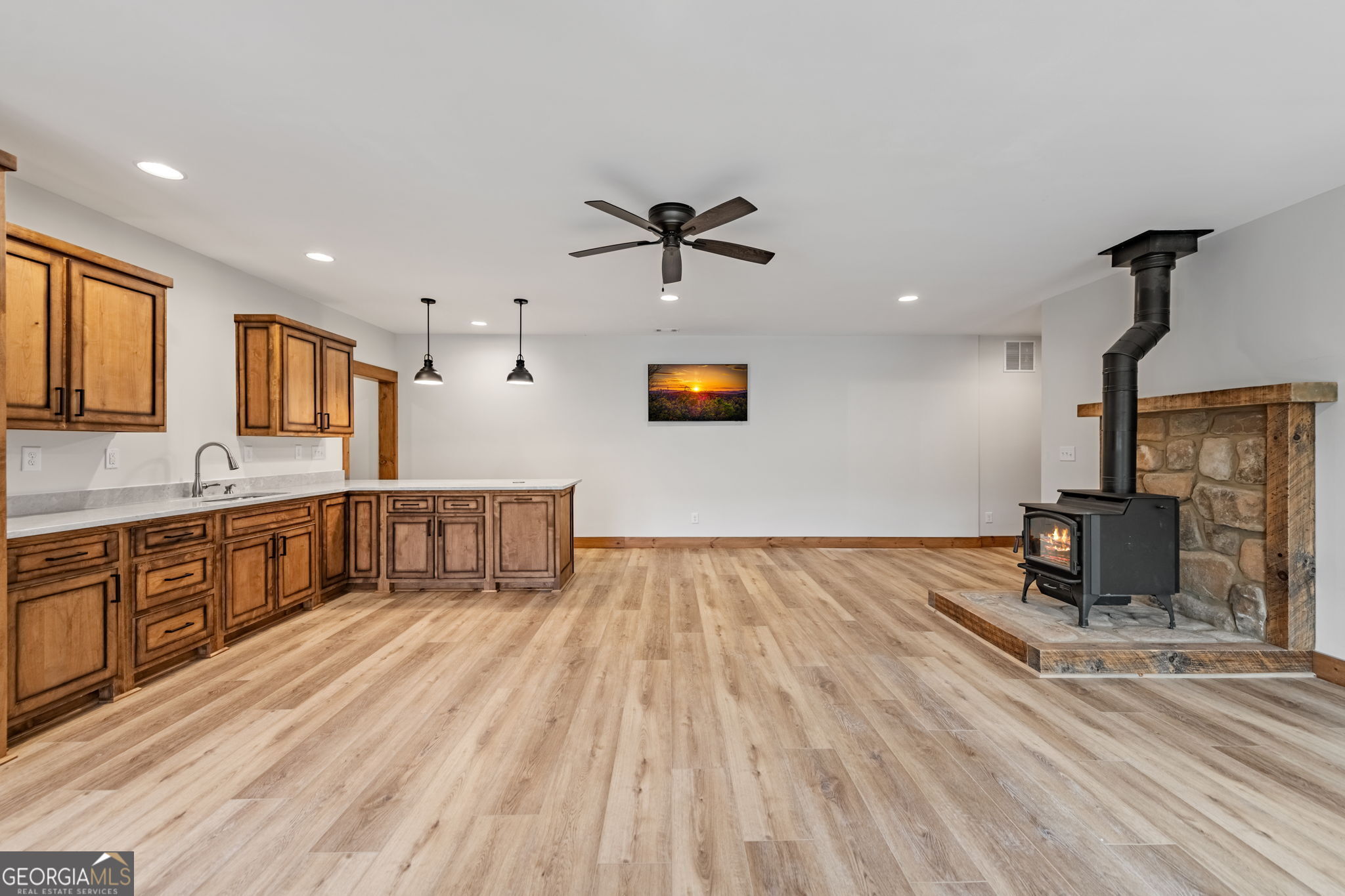 120 Cohutta Ranch Road Blue Ridge, GA 30513 - Photo 69 of 90 a large kitchen with stainless steel appliances a large counter top a sink a refrigerator and a granite counter tops