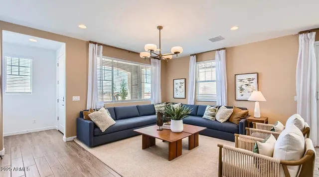 a kitchen with granite countertop a sink stainless steel appliances and cabinets