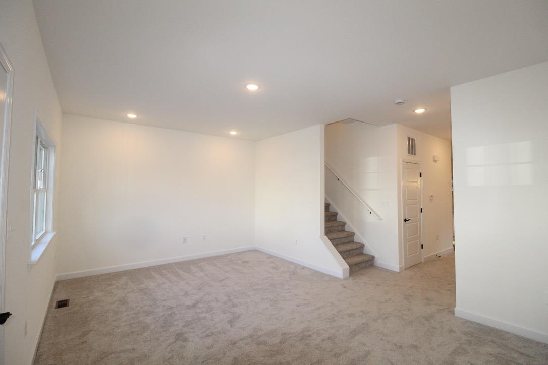 1537 Palomino Trail Harrisonburg, VA 22801 - Photo 2 of 33 an empty room with a stairs and white walls