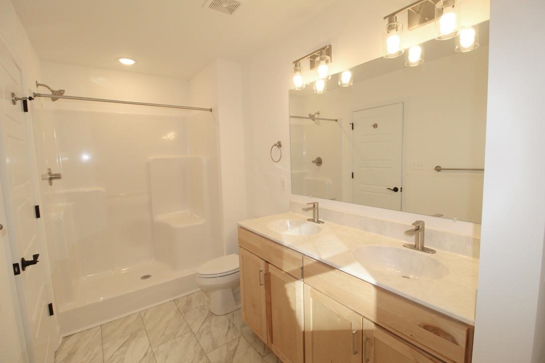 1537 Palomino Trail Harrisonburg, VA 22801 - Photo 26 of 33 a bathroom with a sink a toilet and shower