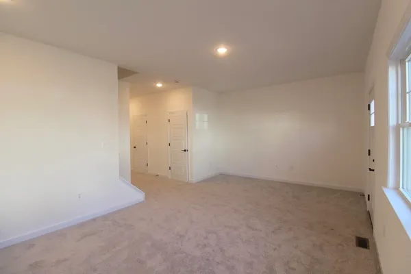 an empty room with an entryway