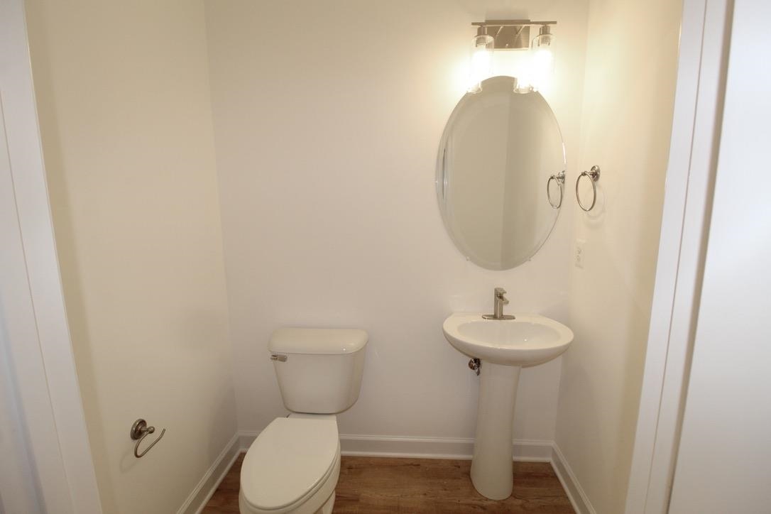 1537 Palomino Trail Harrisonburg, VA 22801 - Photo 6 of 33 a bathroom with a toilet sink and mirror