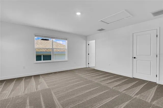 a bathroom with a sink a toilet and bathtub