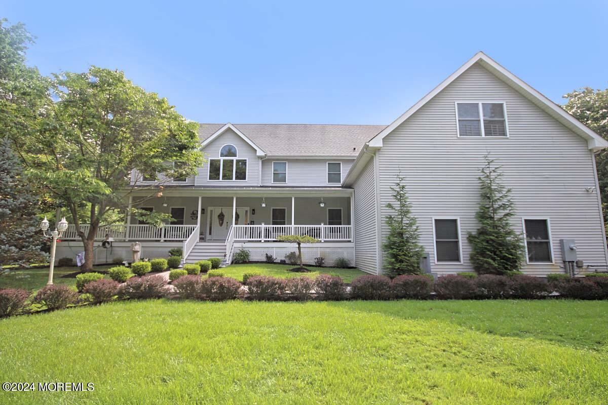 111 Wiseman Road Jackson, NJ 08527 - Photo 1 of 65 a front view of house with yard and green space