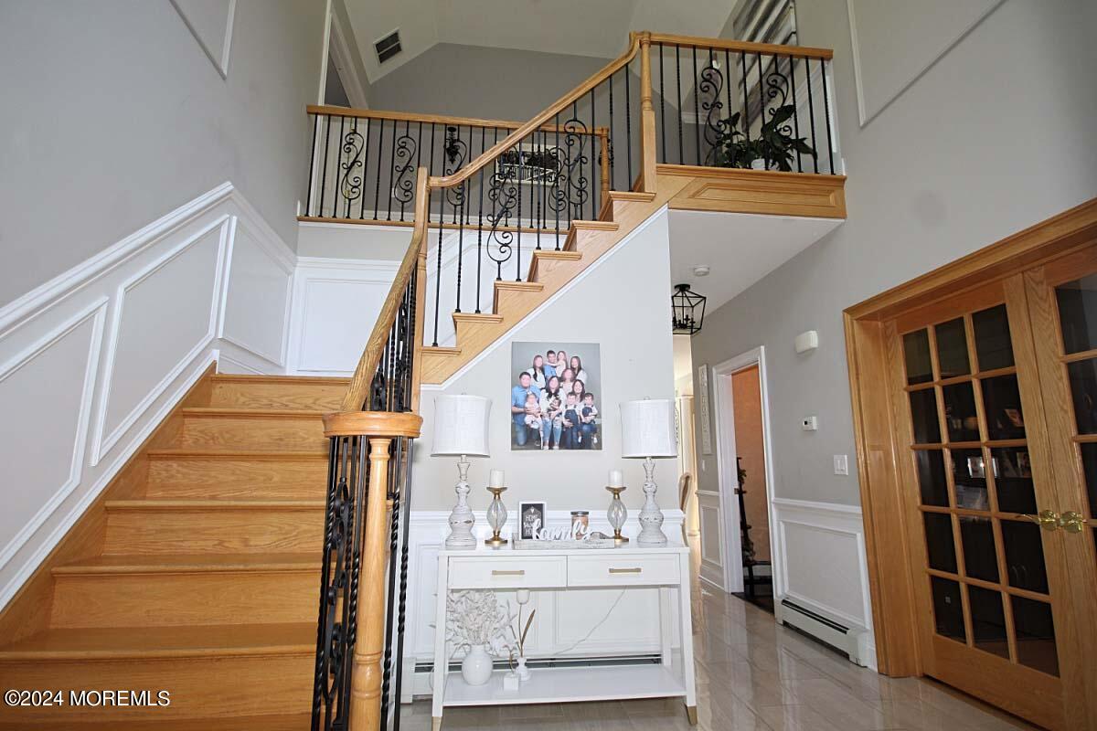 111 Wiseman Road Jackson, NJ 08527 - Photo 30 of 65 a view of entryway and hall with wooden floor