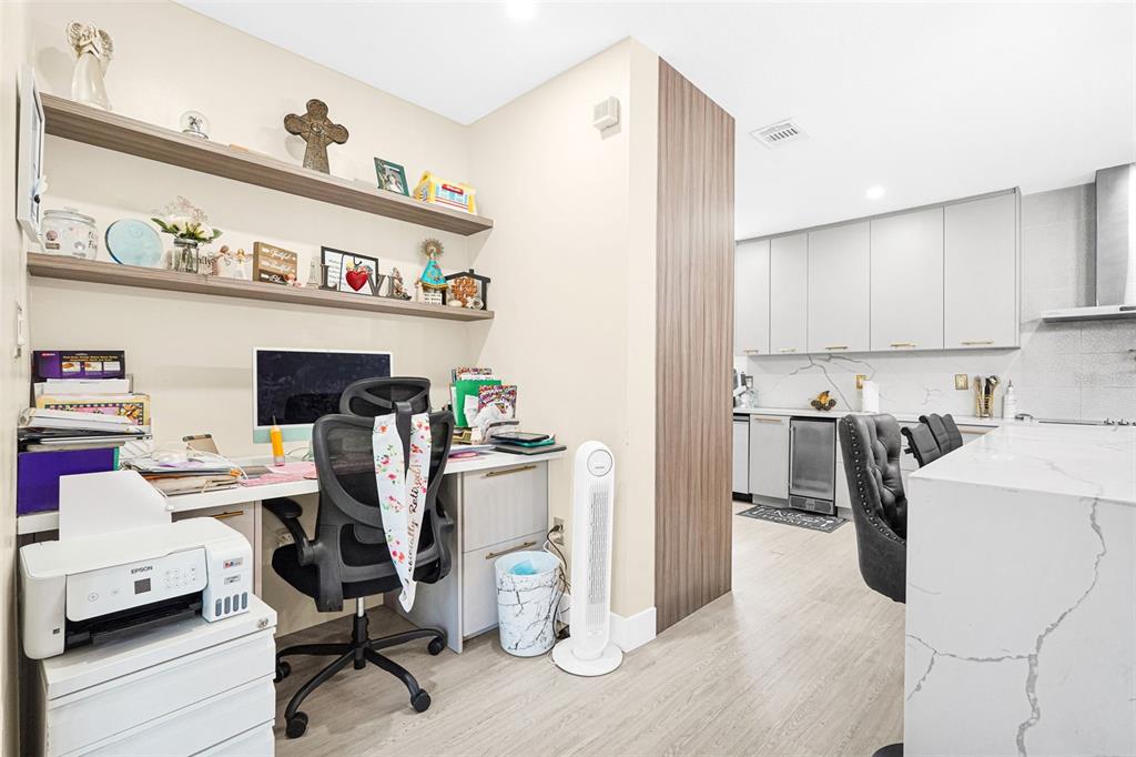 14402 Southwest 157th Path Miami, FL 33196 - Photo 13 of 80 a workspace with furniture and kitchen view