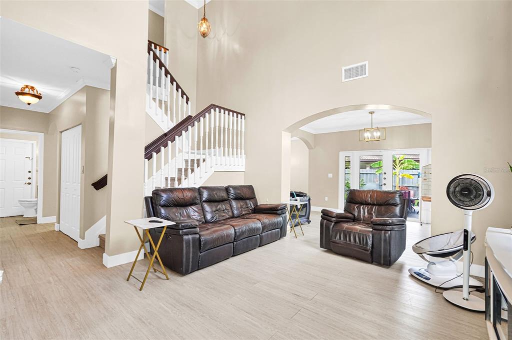14402 Southwest 157th Path Miami, FL 33196 - Photo 18 of 80 a living room with furniture window and wooden floor