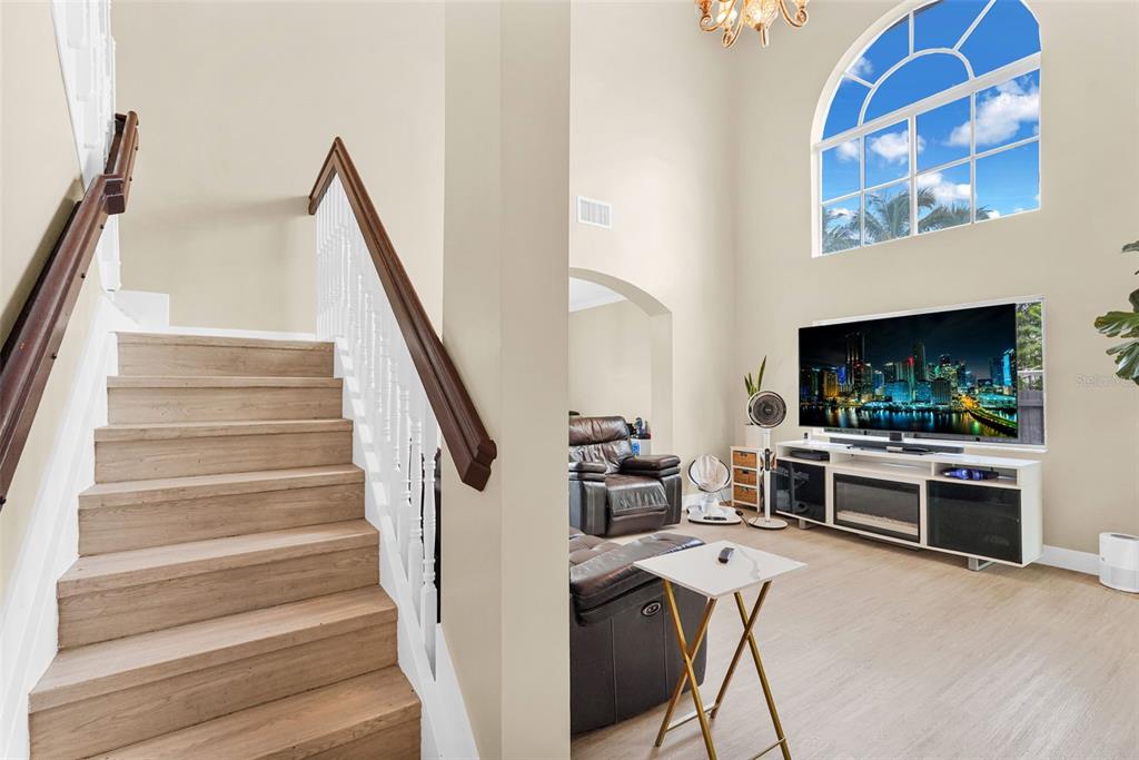 14402 Southwest 157th Path Miami, FL 33196 - Photo 23 of 80 a view of a livingroom with furniture and flat screen tv