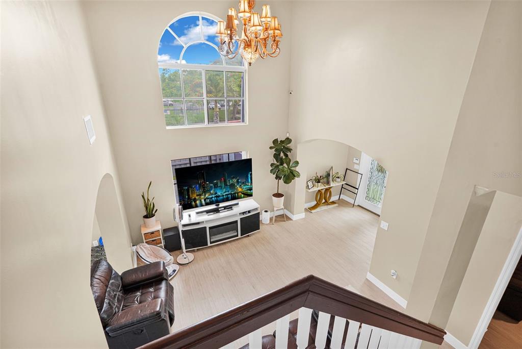 14402 Southwest 157th Path Miami, FL 33196 - Photo 24 of 80 a view of a livingroom with furniture and a fireplace