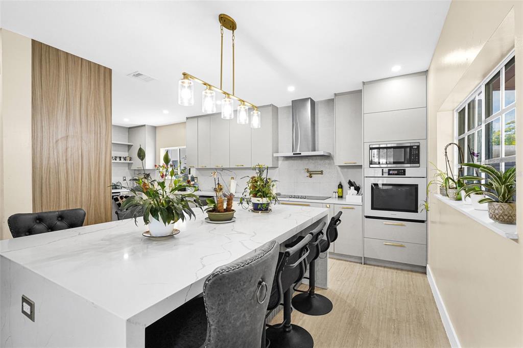 14402 Southwest 157th Path Miami, FL 33196 - Photo 3 of 80 a kitchen with counter space cabinets and appliances
